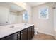 This bathroom offers a double sink vanity, a mirror, and a shower-tub combination at 1008 Scotch Pine Way, Mebane, NC 27302