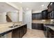 Open kitchen with granite countertops, stainless steel appliances, and wood cabinets at 1008 Scotch Pine Way, Mebane, NC 27302