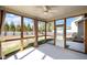 View of the sunroom with screens overlooking the backyard at 1008 Scotch Pine Way, Mebane, NC 27302