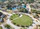Aerial view of a neighborhood park featuring a gazebo and walking trails at 102 Shepton Dr, Cary, NC 27519