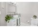 Bright bathroom featuring a vessel sink, mosaic tile backsplash, and modern fixtures at 102 Shepton Dr, Cary, NC 27519