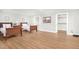 Spacious bedroom with hardwood floors, two beds, and closet at 102 Shepton Dr, Cary, NC 27519