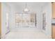Cozy breakfast nook area featuring natural light and tile flooring at 102 Shepton Dr, Cary, NC 27519
