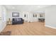 Cozy living room with hardwood floors, comfortable seating, and stylish decor at 102 Shepton Dr, Cary, NC 27519