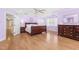 Spacious main bedroom with hardwood floors, large windows, and ample natural light at 102 Shepton Dr, Cary, NC 27519