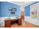 Bright office featuring a classic wooden desk and large window at 102 Shepton Dr, Cary, NC 27519