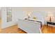 Bright bedroom boasts hardwood floors, large bed, and natural light at 105 Fidelity St # B24, Carrboro, NC 27510