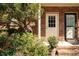 Charming brick home entrance with well-maintained landscaping and welcoming front doors at 105 Fidelity St # B24, Carrboro, NC 27510