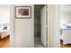 Hallway view showcases bedrooms and a full bathroom with shower at 105 Fidelity St # B24, Carrboro, NC 27510