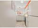 Bright kitchen with white appliances, butcher block countertops, and stylish colorful accents throughout at 105 Fidelity St # B24, Carrboro, NC 27510