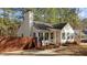 Charming single-Gathering home with green shutters, an inviting front porch and patriotic curb appeal at 1109 Sorcerer Ct Ct, Knightdale, NC 27545