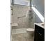 Updated bathroom boasts new grab bars and shelving unit at 111 Kalmia Dr, Durham, NC 27703