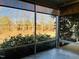 Relax in this screened-in porch, offering serene views of the lush backyard at 111 Kalmia Dr, Durham, NC 27703