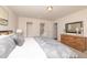 Serene main bedroom with soft carpeting, neutral walls, and ensuite bathroom access at 114 Johnson Ridge Way, Four Oaks, NC 27524