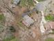 Aerial shot showcasing property with back deck and patio at 115 Perth Pl, Durham, NC 27712