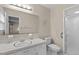 Bathroom with a white vanity and a shower with glass doors at 115 Perth Pl, Durham, NC 27712