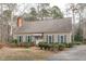 Charming single-story home with mature landscaping and welcoming entrance at 115 Perth Pl, Durham, NC 27712