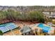 Community featuring tennis courts, a pool, playground, and lush greenery at 1208 Anora Dr, Apex, NC 27502