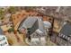 Beautiful aerial view of the house and grounds with a patio and deck at 1208 Anora Dr, Apex, NC 27502