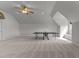 Large bonus room with basketball hoop and ping pong table for recreation at 1208 Anora Dr, Apex, NC 27502