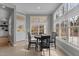 Bright breakfast nook with many windows, perfect for enjoying morning coffee at 1208 Anora Dr, Apex, NC 27502