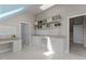 The craft room features built-in desks, ample storage and good natural light at 1208 Anora Dr, Apex, NC 27502