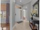 Welcoming foyer with tiled floors, complemented by neutral paint and decor at 1208 Anora Dr, Apex, NC 27502