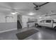 Spacious 3 car garage with stairs to the main floor and tons of storage at 1208 Anora Dr, Apex, NC 27502
