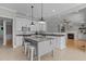 Well-equipped kitchen with granite countertops and a functional center island at 1208 Anora Dr, Apex, NC 27502