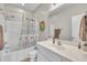 This bathroom features a shower-tub combo, and a single sink vanity at 149 Winterberry St, Clayton, NC 27527