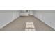This bonus room features a neutral carpet and good natural light at 149 Winterberry St, Clayton, NC 27527