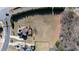 Aerial view of a home nestled on a large lot with mature landscaping and a private backyard at 17 Beckwith Ave, Clayton, NC 27527