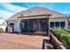 Inviting screened-in back porch and wooden deck for outdoor relaxation and entertaining at 17 Beckwith Ave, Clayton, NC 27527