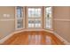 Cozy breakfast nook with bay windows and hardwood floors at 17 Beckwith Ave, Clayton, NC 27527