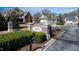 Community entrance featuring brick signage and manicured greenery, offering a welcoming atmosphere at 17 Beckwith Ave, Clayton, NC 27527