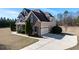 Charming two-story home boasts brick and siding exterior with manicured landscaping and a driveway at 17 Beckwith Ave, Clayton, NC 27527