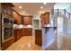 Stylish kitchen featuring wood cabinets, stainless steel appliances, and granite countertops at 17 Beckwith Ave, Clayton, NC 27527