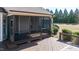 Well-maintained screened porch connected to a deck, providing ample outdoor living space at 17 Beckwith Ave, Clayton, NC 27527