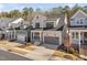 Beautiful home featuring stone accents, a covered porch, and a convenient attached two-car garage at 173 Monteith Dr, Chapel Hill, NC 27516