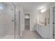 Bright bathroom showcasing a glass-enclosed shower, double vanity, and modern finishes at 1783 Ballard Rd # Apex Georgian, Fuquay Varina, NC 27526