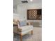 Bonus room with a modern chair, games, and a bench creating a cozy corner at 1783 Ballard Rd # Apex Georgian, Fuquay Varina, NC 27526