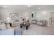 Neutral-toned bonus room furnished with comfortable seating and modern décor at 1783 Ballard Rd # Apex Georgian, Fuquay Varina, NC 27526