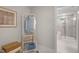 Bright laundry area with modern rack and shower access, offering convenience and style at 1783 Ballard Rd # Apex Georgian, Fuquay Varina, NC 27526