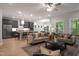Open-concept living area, kitchen and dining, featuring modern decor and lots of natural light at 1783 Ballard Rd # Apex Georgian, Fuquay Varina, NC 27526