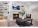 Living room with a modern fireplace with marble surround and stylish decor at 1783 Ballard Rd # Apex Georgian, Fuquay Varina, NC 27526