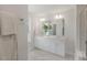 An elegant bathroom features double sinks, a large mirror, and modern fixtures at 1803 Ballard Rd # Holly Craftsman, Fuquay Varina, NC 27526