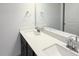 Bathroom with a double sink vanity with quartz countertop and a large mirror at 1803 Ballard Rd # Holly Craftsman, Fuquay Varina, NC 27526