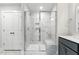 Modern bathroom features a glass shower with marble tile and built-in bench at 1803 Ballard Rd # Holly Craftsman, Fuquay Varina, NC 27526