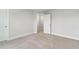 Bedroom featuring plush carpeting, base molding, and a closet at 1803 Ballard Rd # Holly Craftsman, Fuquay Varina, NC 27526