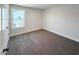 Neutral bedroom, with carpet, natural light, and a minimalist design at 1803 Ballard Rd # Holly Craftsman, Fuquay Varina, NC 27526